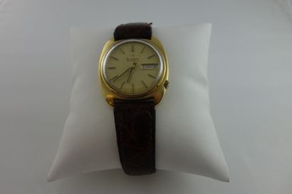 BULOVA Montre bracelet d'homme, boitier rond en or jaune (750).

Cadran à fond doré...