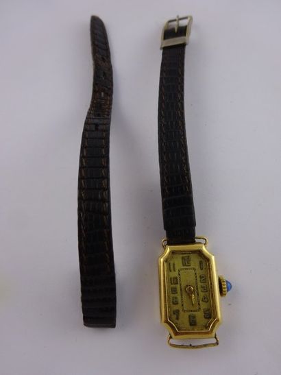 null Petite montre de dame, boîtier en or jaune (750) rectangulaire à pans coupés.

Cadran...
