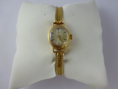 UTI Montre bracelet de dame en or jaune (750), boîtier rond, cadran fond crème à...