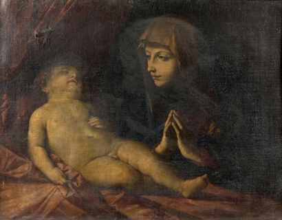 Ecole de Guido RENI (1573 - 1642) La Vierge adorant l'Enfant endormi.
Huile sur toile.
66,8...