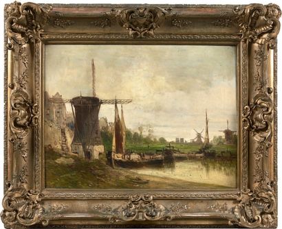 Eugène DESHAYES (1828-1890) Moulins sur un canal en Hollande.
Huile sur toile signée...