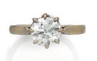 null Bague solitaire en or gris (750) ornée d'un diamant de taille ancienne en serti...