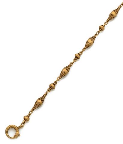 WIESE 
Collier en or jaune (750) composé d'une alternance de perles d'or et de motifs...