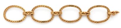 VAN CLEEF & ARPELS 
Bracelet articulé en or jaune (750) formé de quatre anneaux à...