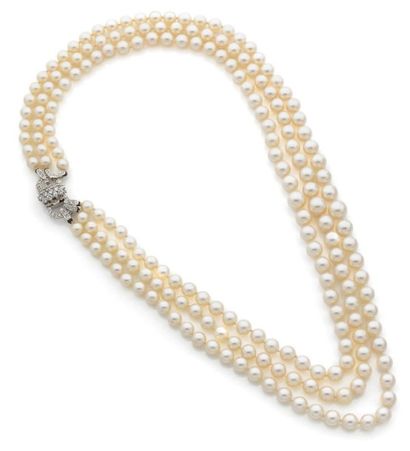 null Collier à transformations composé de trois rangs de perles de culture blanches...