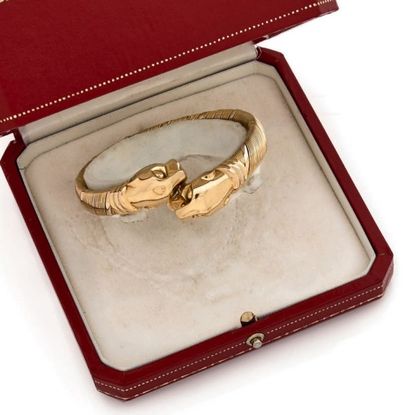 CARTIER, COUGAR 
Bracelet jonc trois ors (750) en fils d'or torsadés, le fermoir...