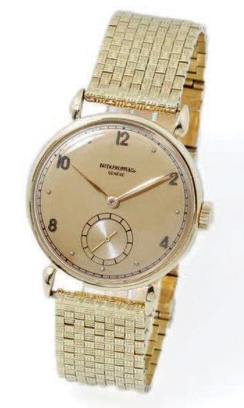 PATEK PHILIPPE & Co 
REF 1509
Montre bracelet d'homme en or (750), cadran doré avec...