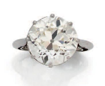 null Bague solitaire en or 750 et platine 850 millièmes ornée d'un diamant taille...