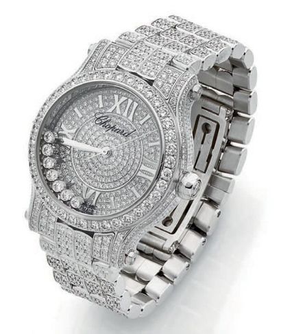 CHOPARD 
"HAPPY SPORT"
Montre bracelet de dame en or gris 750 millièmes, cadran avec...
