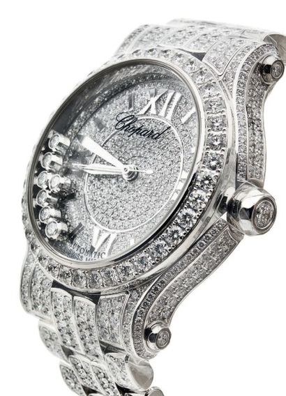 CHOPARD 
"HAPPY SPORT"
Montre bracelet de dame en or gris 750 millièmes, cadran avec...