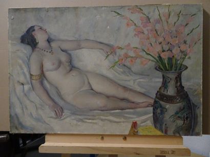 Ecole du XXème siècle 

Femme nue allongée.

Huile sur toile.

54 x 82 cm.
