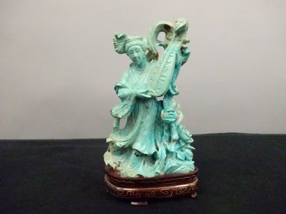 CHINE 


Sujet en turquoise sculptée représentant une musicienne. 


XXème siècle.


H....