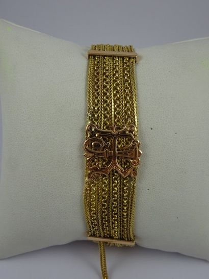 null Bracelet en or jaune et rose (750) formé de neuf chaînettes maille Jaseron et...