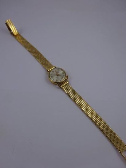 GALA 

Montre bracelet de dame en or jaune (750)

Boîtier rond. 

Cadran argent rayonnant,...
