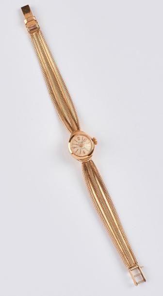 EMO 

Montre-bracelet de dame en or jaune (750). 

Boîtier ovale.

Cadran circulaire...