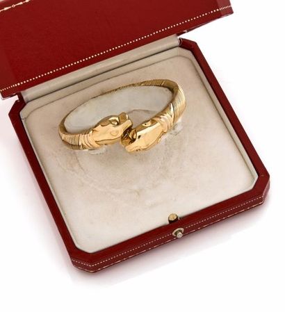 CARTIER Cougar
Bracelet jonc trois ors (750) en fils d'or torsadés, le fermoir à...