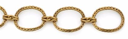 VAN CLEEF & ARPELS Bracelet articulé en or jaune (750) formé de quatre larges maillons...
