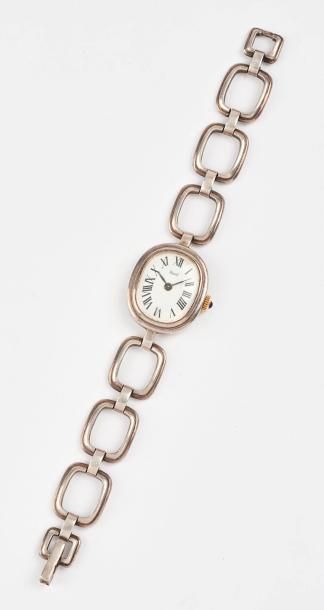 DERMONT 

Montre bracelet de dame en argent (925). 

Boîtier de forme ovale, lunette...