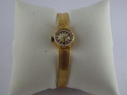 ADMIRA Montre bracelet de dame en or jaune (750). Boîtier rond. Cadran signé à fond...
