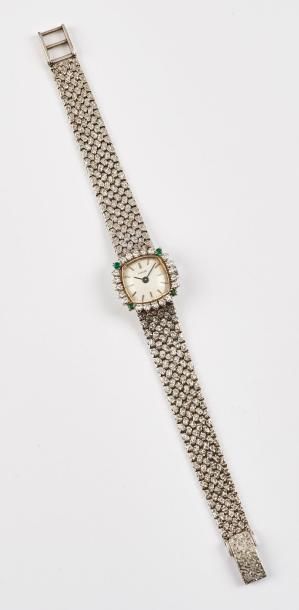 PARKER 

Montre bracelet de dame en or gris (750). 

Boîtier carré à angles arrondis,...