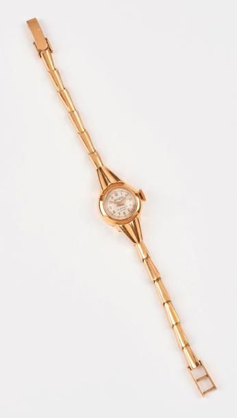 ROY WATCH 

Montre bracelet de dame en or jaune (750).

Boîtier circulaire. 

Cadran...