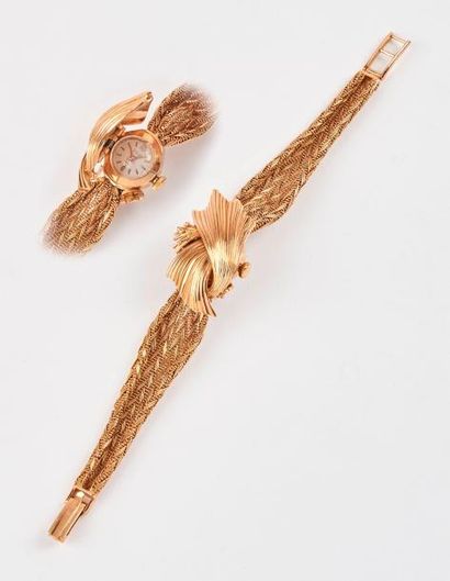 YRIE 

Montre bracelet de dame en or jaune (750).

Boîtier circulaire.

Cadran champagne,...