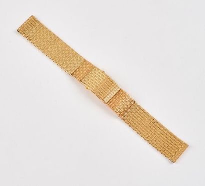 null Bracelet de montre en or jaune (750), maillons articulés, à décor de damier...