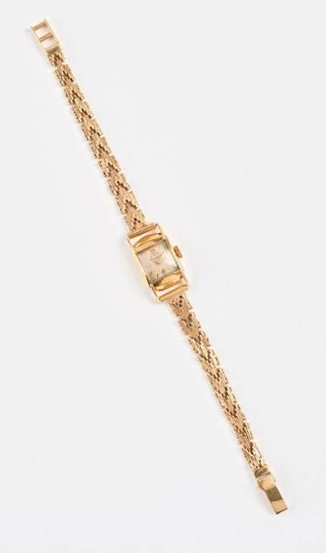 GIRARD PERREGAUX 

Montre bracelet de dame en or jaune (750).

Cadran rectangulaire...