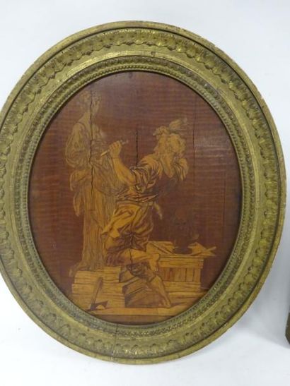 null Le sculpteur.

Panneau ovale en marqueterie de bois. 

XIXème siècle.

40 x...
