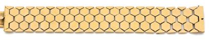 null Bracelet ruban en or jaune (750) à maille nid d'abeille.
Fermoir cliquet et...