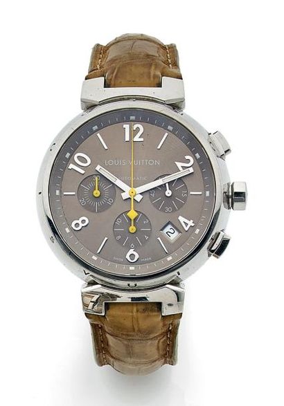 LOUIS VUITTON Tambour Montre chronographe bracelet d'homme. Boîtier rond en acier....