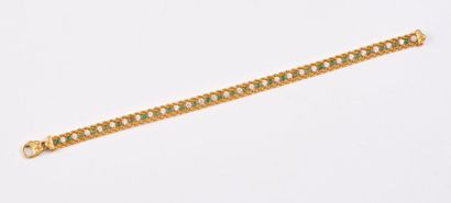 null Bracelet articulé en or jaune (750) formé de deux mailles torsadées, centrées...