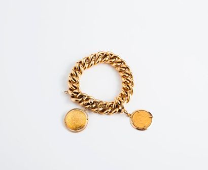 null Bracelet en or jaune (750) à maille gourmette creuse agrémenté d'une pièce de...