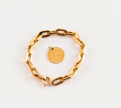 null Bracelet articulé en or jaune (750) à maillons oblongs creux.

Fermoir anneau...