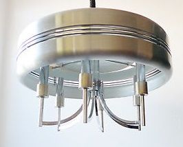 RAAK Ed-UFO 

Lustre moderniste en métal chromé à six bras de lumière. 

55 x 33...