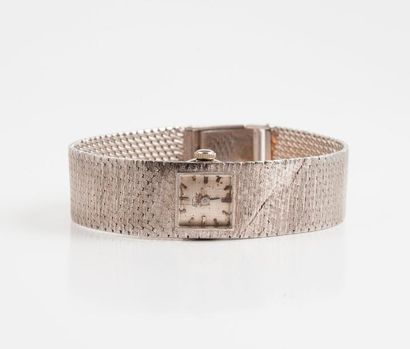 FEUDOR 

Montre bracelet de dame en or gris (750). 

Cadran carré, signé, à fond...