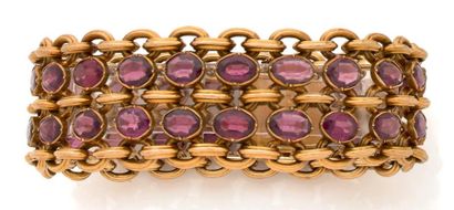 null Bracelet ruban en or jaune (750) à maillons ovales articulés, et orné de deux...