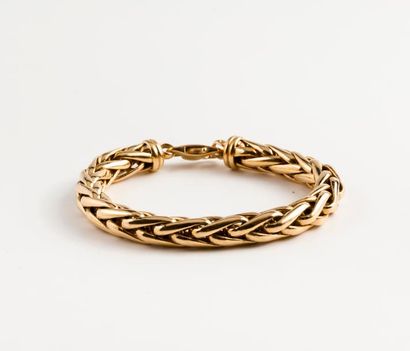 null Bracelet en or jaune (750) à maille palmier. 

Fermoir mousqueton. 

Poids :...