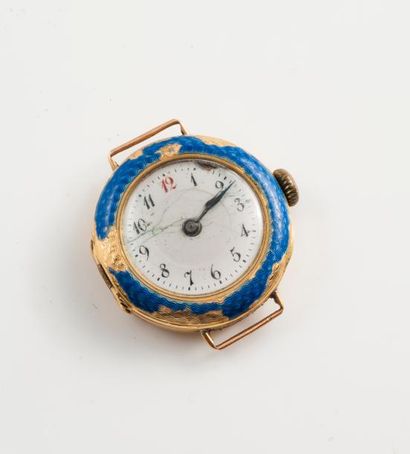 null Boîtier de montre bracelet en or jaune (750).

Lunette émaillée bleu. 

Dédicacée...