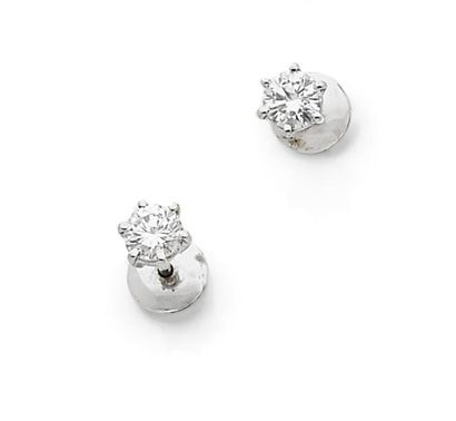 null Paire de puces d'oreilles en or gris (750) ornées de diamants demi-taille en...