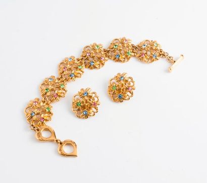Yves Saint LAURENT 

Demi parure en métal doré à décor floral ornée de pierres de...