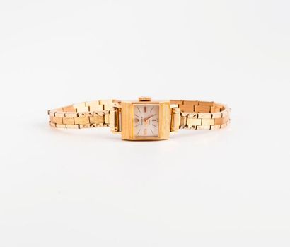 ROLEX, Précision 

Montre bracelet de dame. 

Boîtier rectangulaire en or jaune (750)...