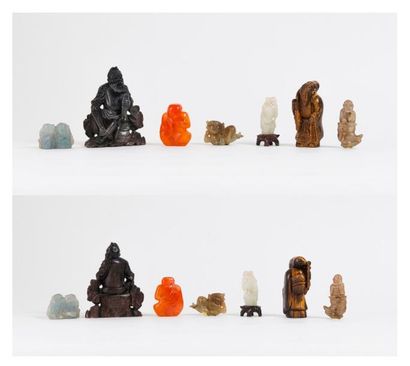CHINE, XXème siècle 

Sept sujets :

- Bouddha assis en cornaline.

H. : 5,7 cm....