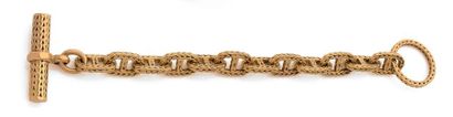 null Important bracelet articulé en or jaune (750) à maille chaîne d'ancre tressée.
Fermoir...