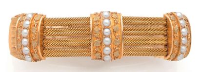 null Demi-parure en or jaune (750) comprenant un bracelet et un collier draperie,...
