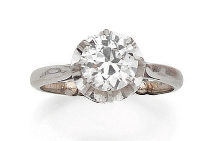 null Bague solitaire en or gris (750) et platine (850) centrée d'un diamant taille...