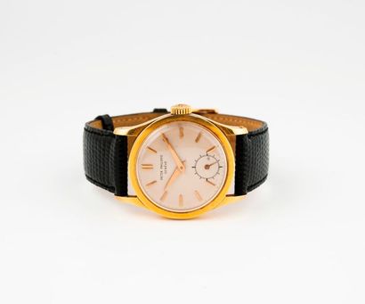 PATEK PHILIPPE Genève  Montre bracelet d'homme. 
Boîtier rond en or jaune (750). 
Cadran...