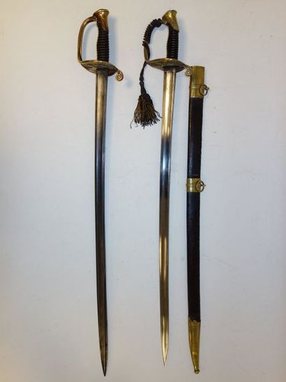 France 

Deux sabres d'officier, modèle 1845.

Garde en laiton à une branche et plateau...