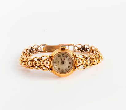 LIODI 

Montre bracelet de dame en or jaune (750).

Boîtier rond.

Cadran à fond...