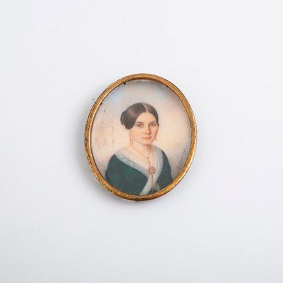 ECOLE FRANCAISE DU XIXème siècle 

Portrait miniature ovale. 

Portrait de femme...